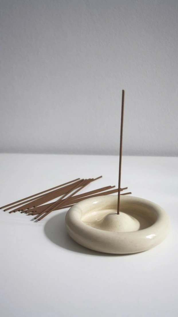 Handmade air dry clay piece styled on a shelf